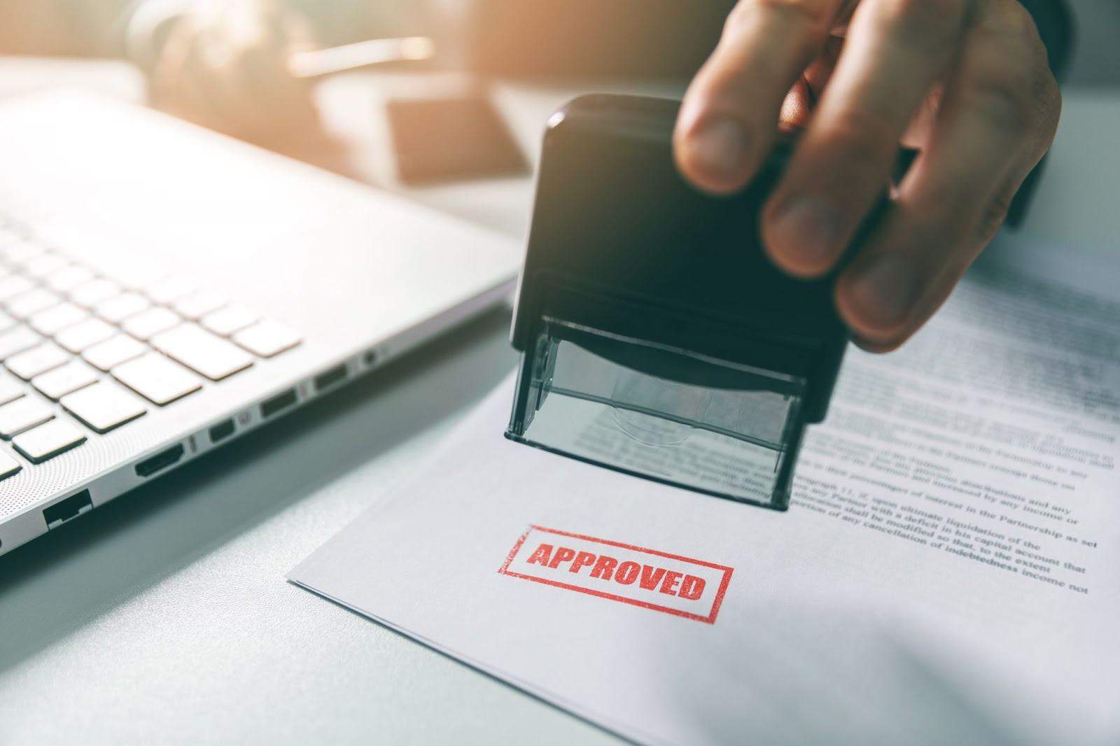 Approved real estate permit document symbolizing faster permitting, zoning flexibility, and aligned incentives under OBBB regulatory changes in Texas.