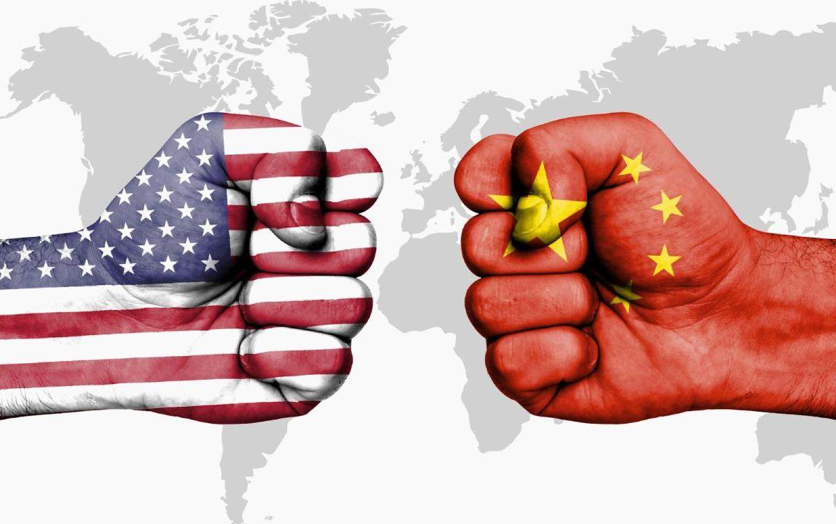 USA and China Flag Fists: Symbolizing global trade tensions and tariff disputes in the construction market.