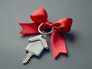 House key with red ribbon symbolizing Texas land donation and real estate tax deduction benefits for charity.