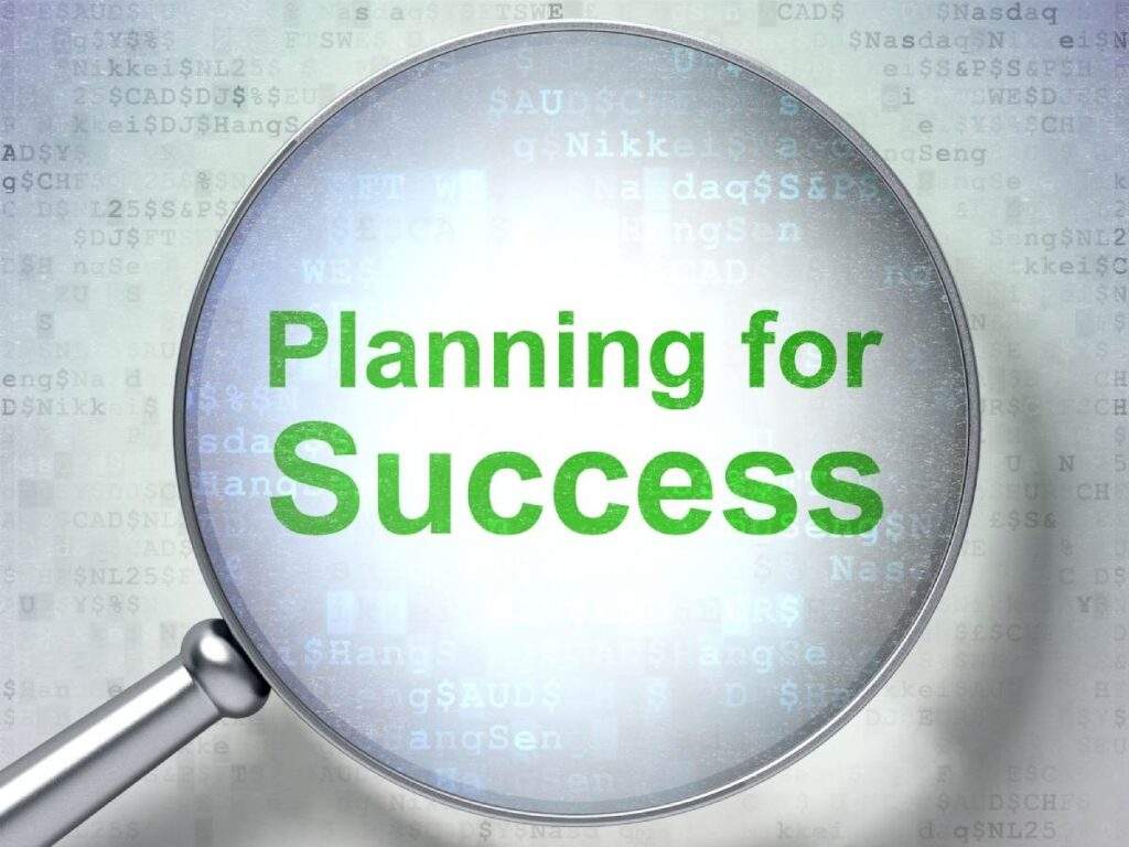 Magnifying glass over “Planning for Success” illustrating strategic tax planning for Texas real estate investors.