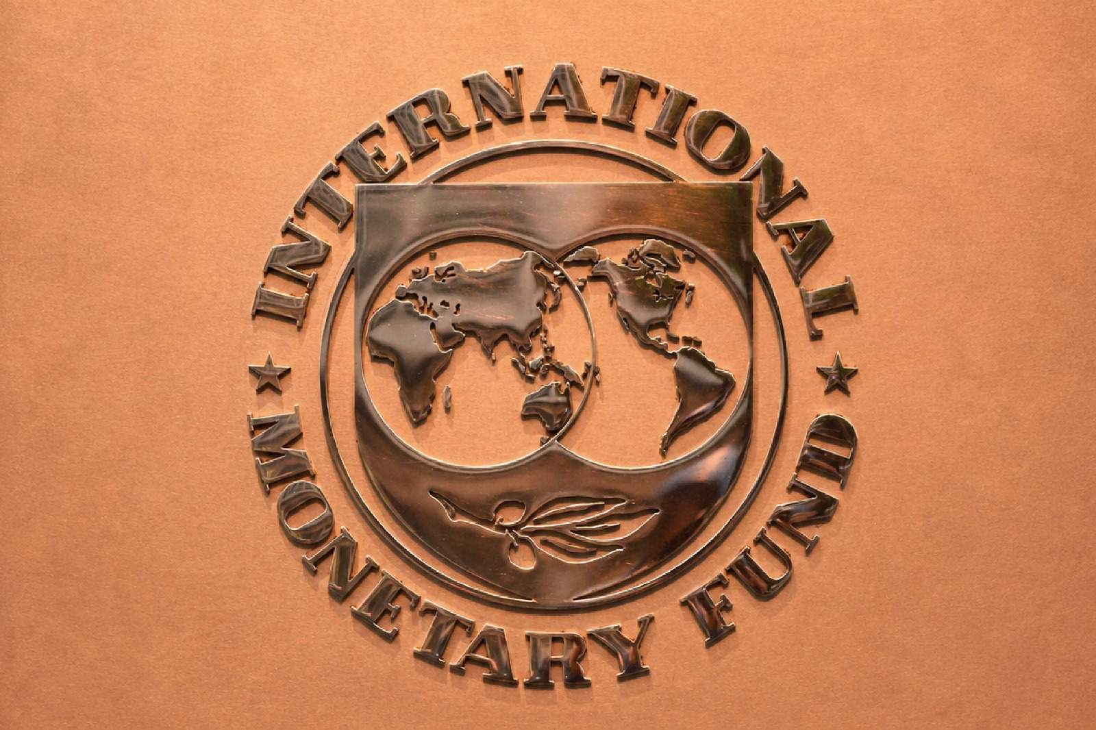 International Monetary Fund headquarters emblem in Washington DC, representing global monetary policy and reserve currency dynamics